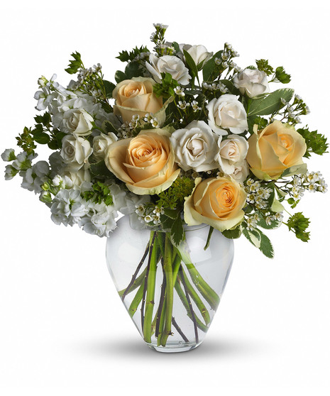 yellow and white rose arrangement