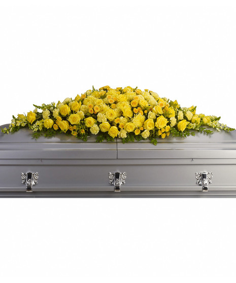 yellow roses in casket spray