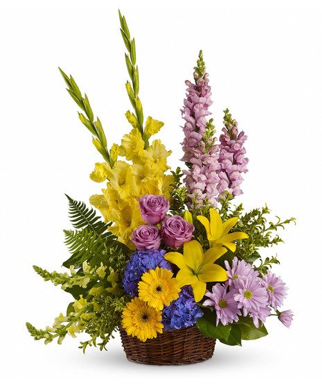 towering floral tribute in lavender and yellow