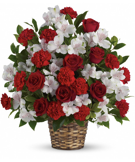 red and white flowers in a basket