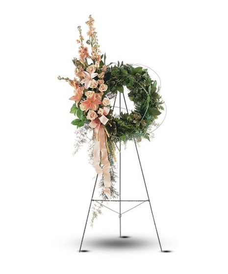 white and peach floral wreath appropriate for funerals