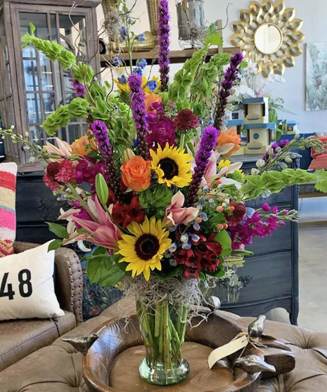 garden-style tall floral arrangement